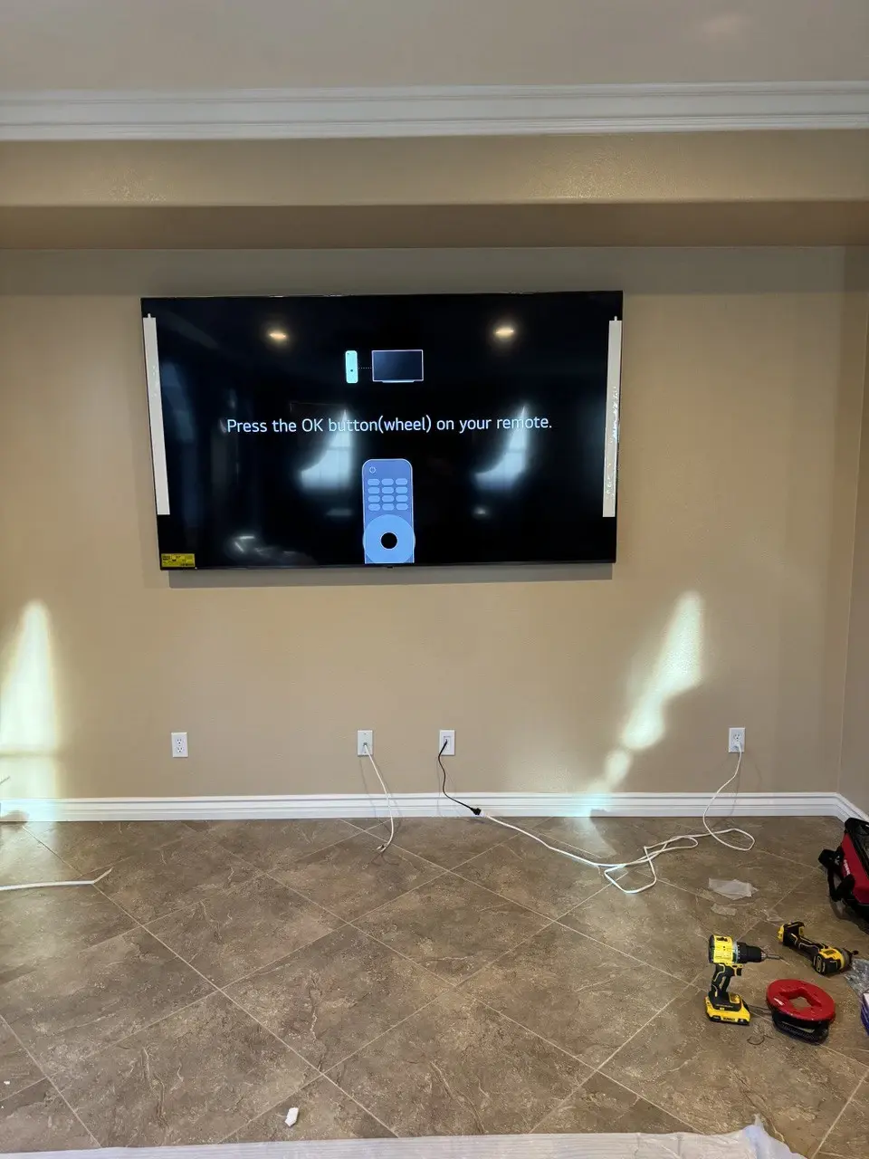 TV mounting in progress